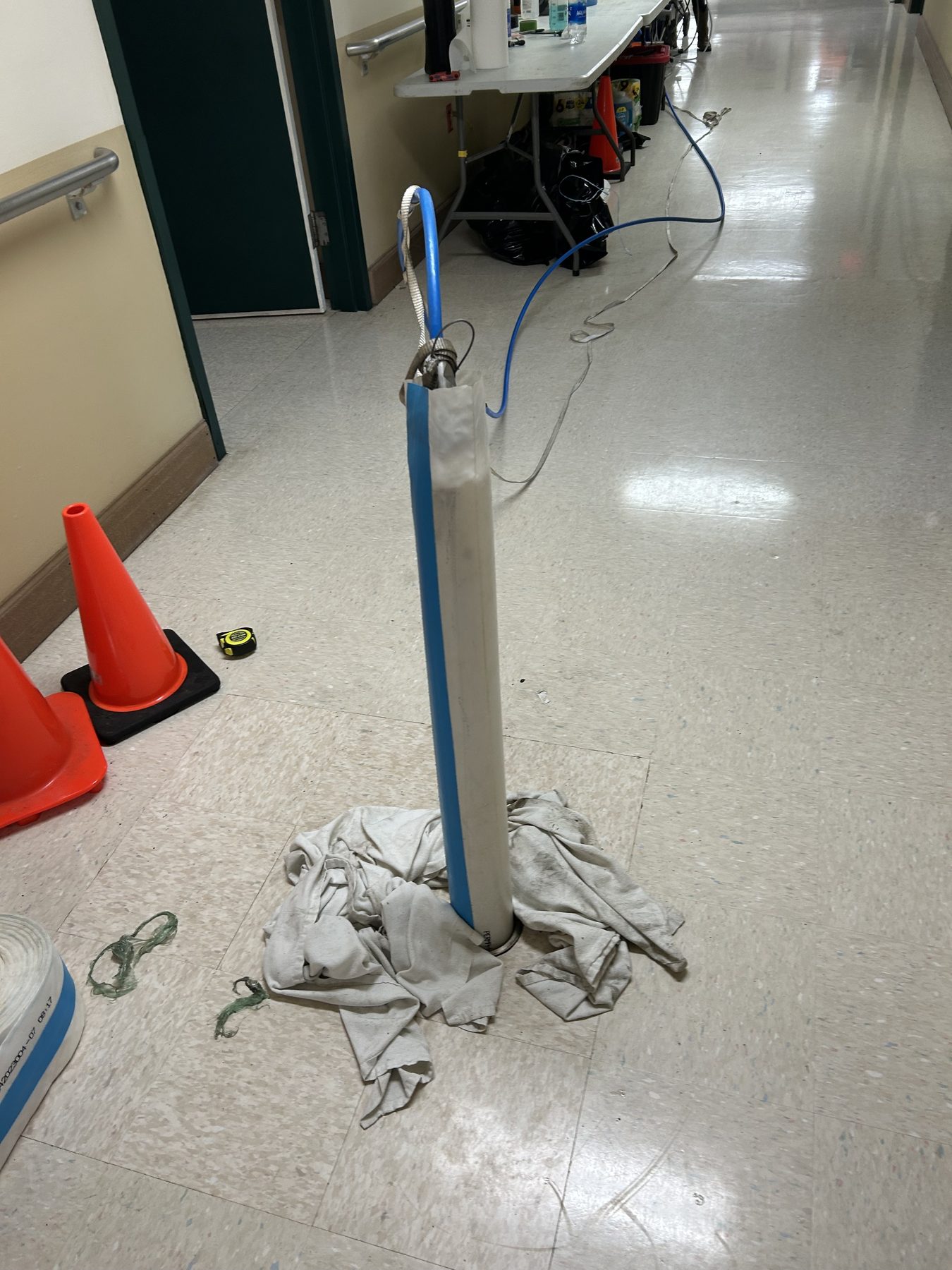 Trenchless pipe lining inside an occupied commercial building