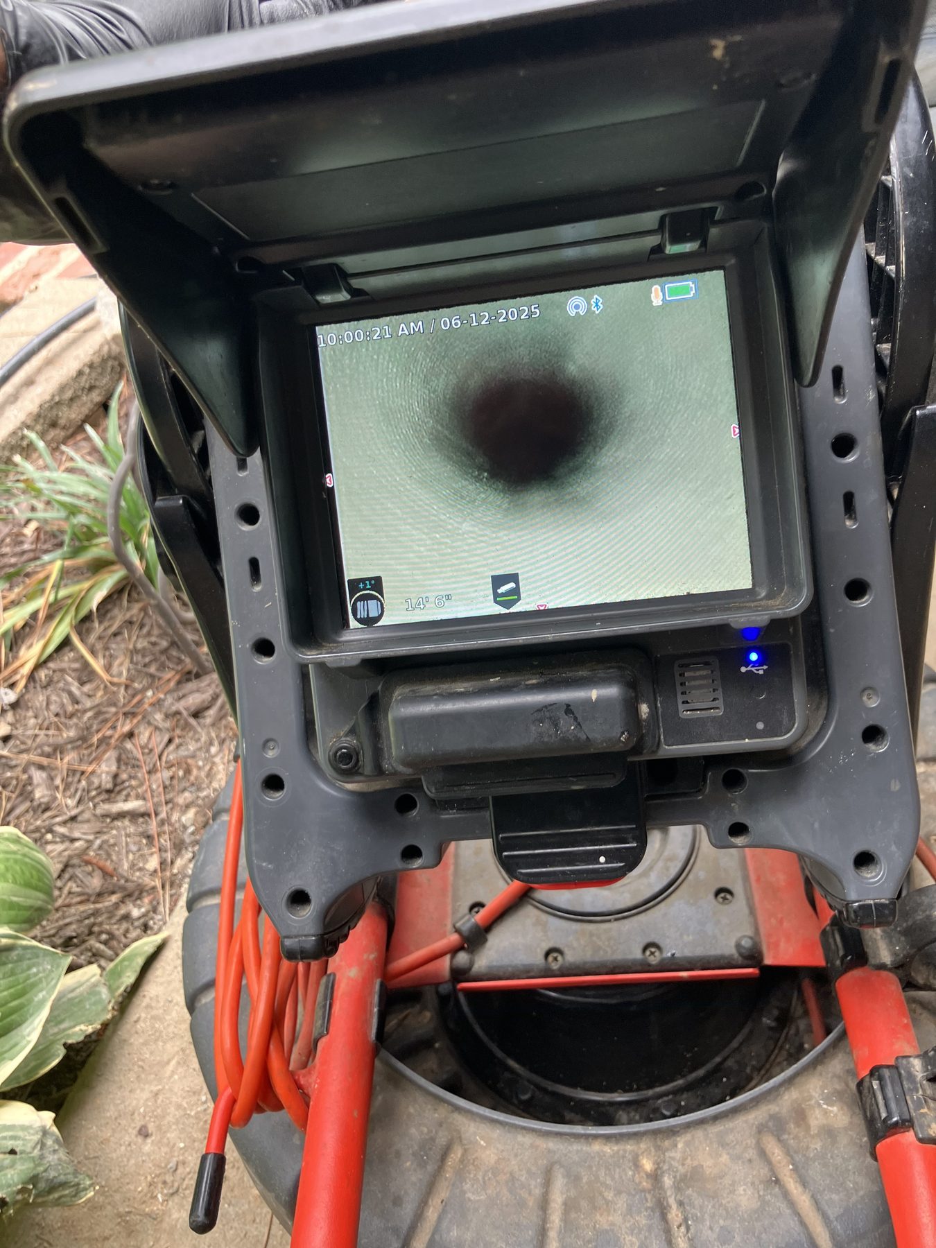 Sewer camera inspection monitor at a cleanout